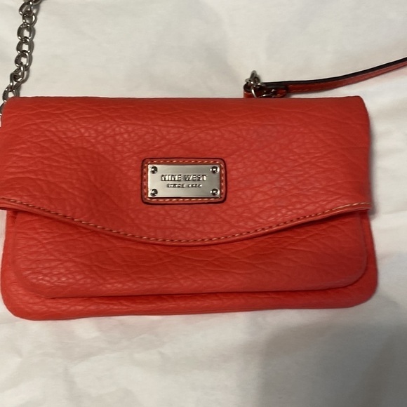 Nine West coral over the shoulder purse that can be turned into a wristlet. - Picture 1 of 10
